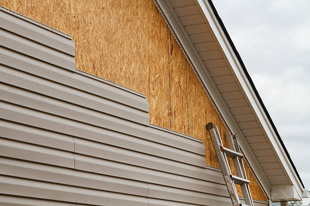 Professional Emergency Siding Repair technician working in Redmond, WA
